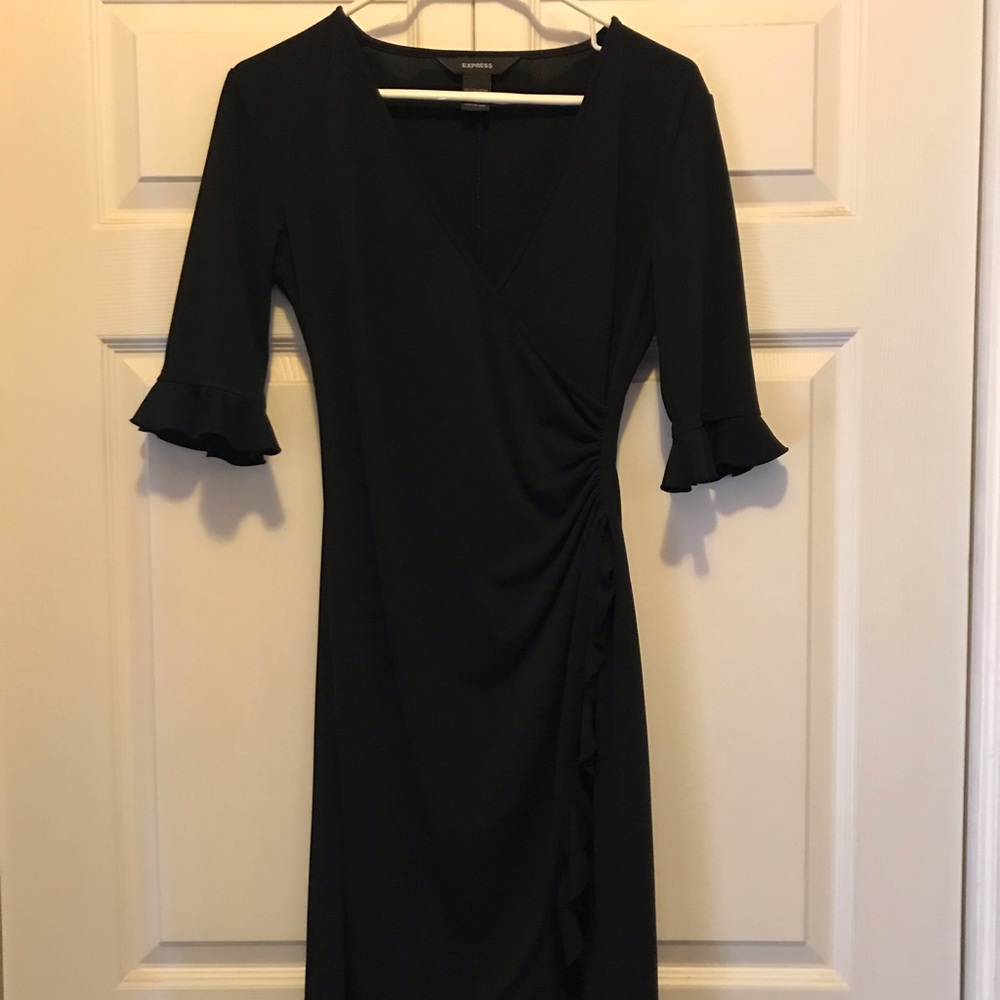 Express black dress with scalloped detail.
